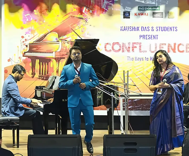 Singers and musicians on stage at Confluence 2025