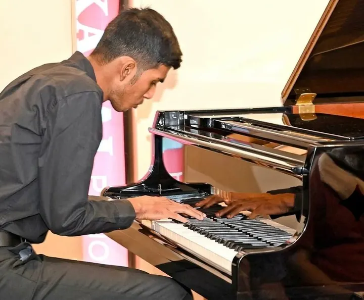 Maharshi Ghosh at the Kawai piano